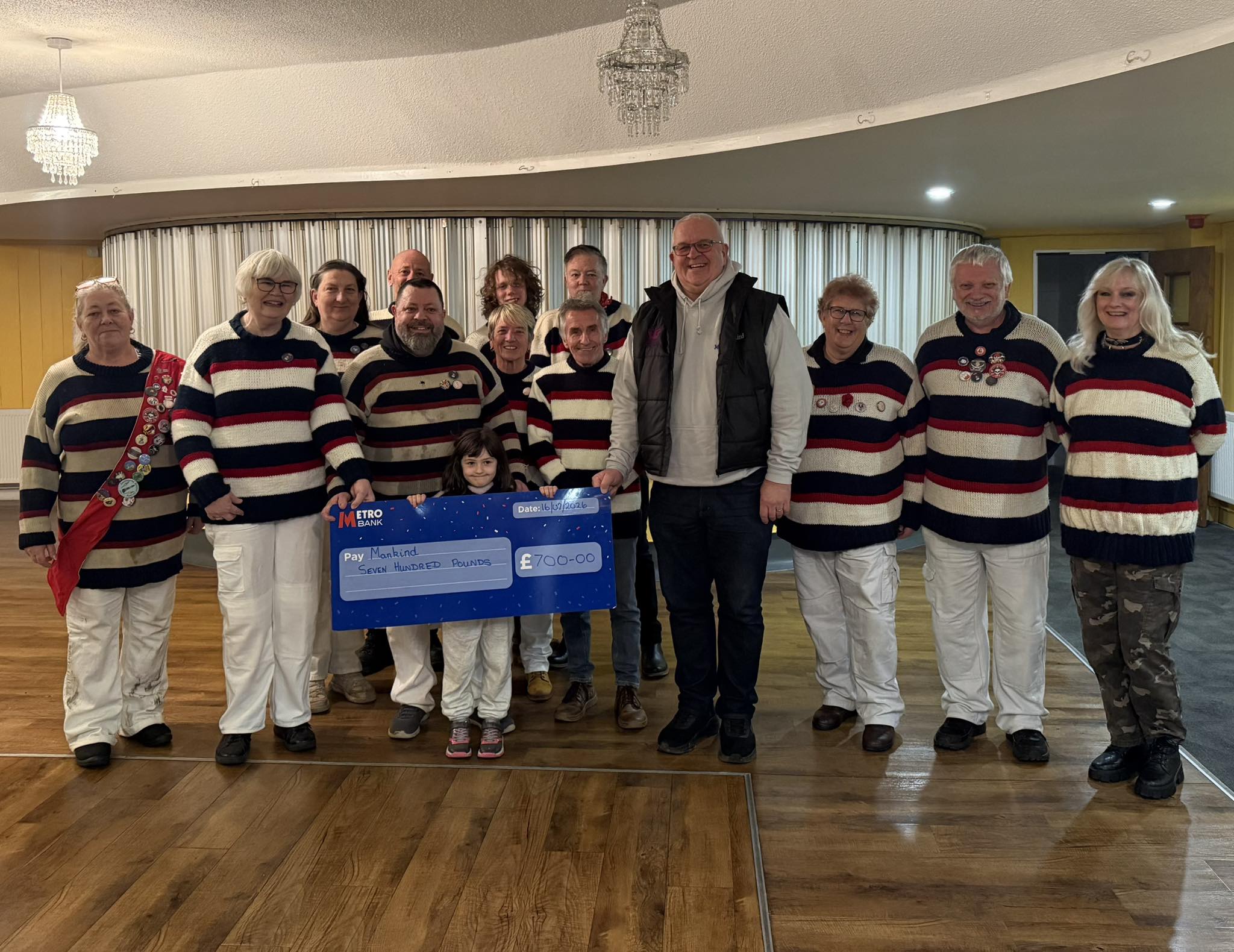 EBS members present ManKind with a cheque for £700