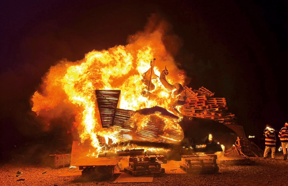 Pirate holding a burning torch