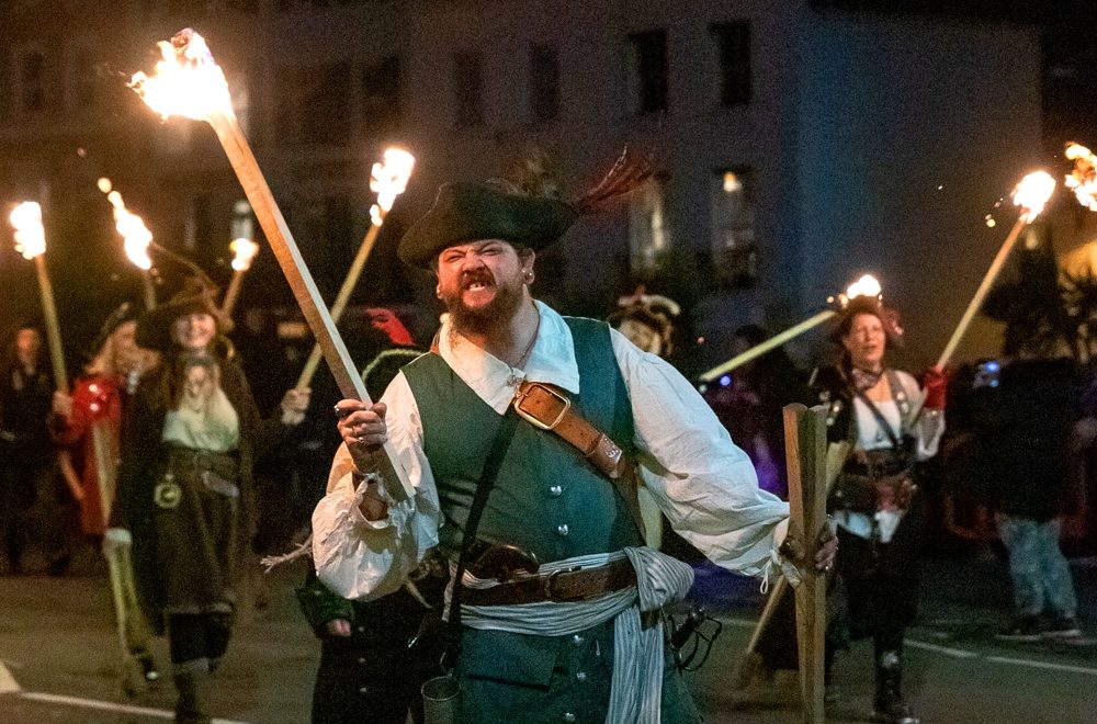 Pirate holding a burning torch